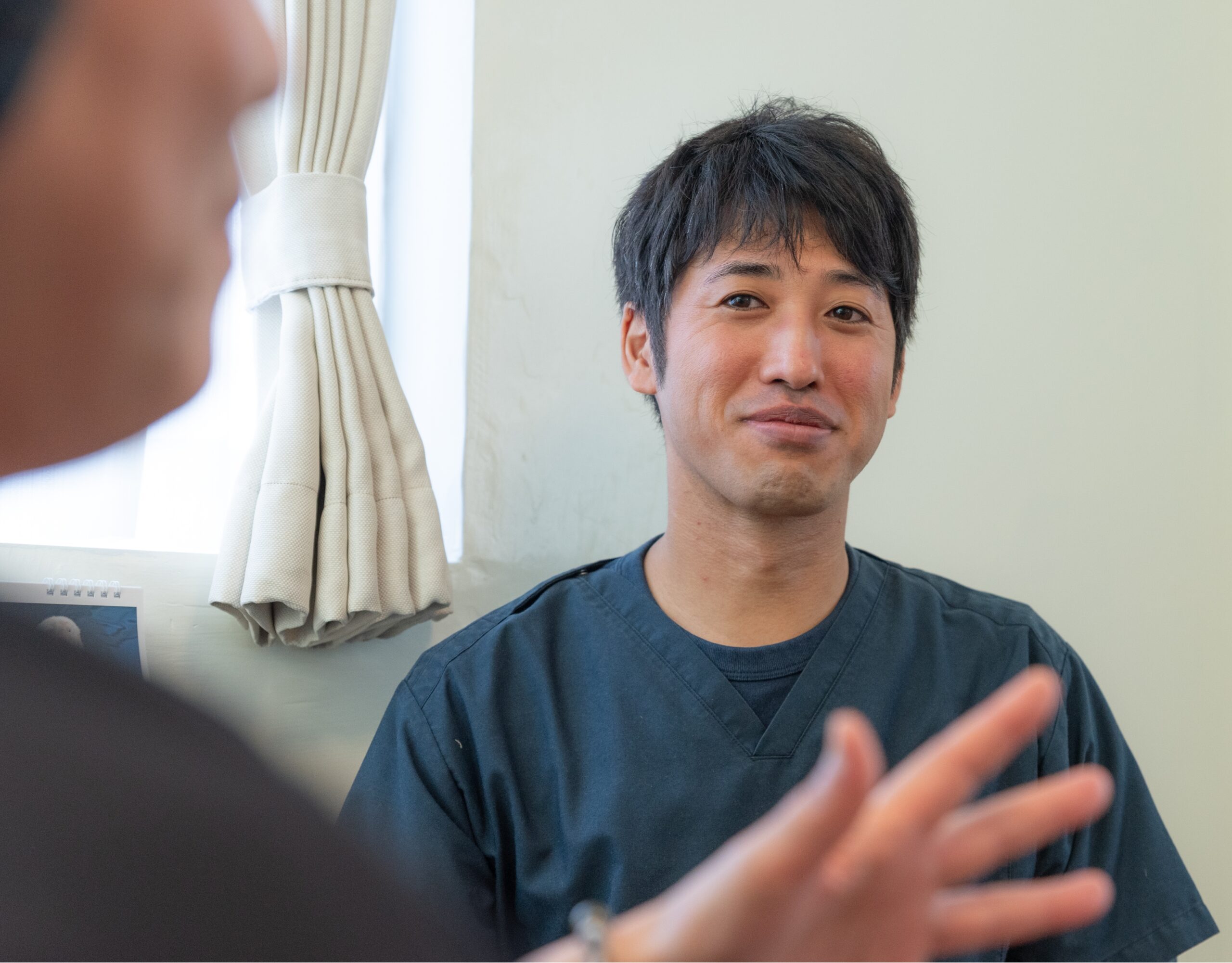 お客様のお悩みや目標を丁寧に伺う様子